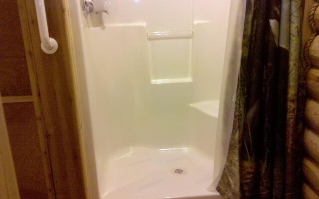 Wolf Den Log Cabin Motel and RV Park