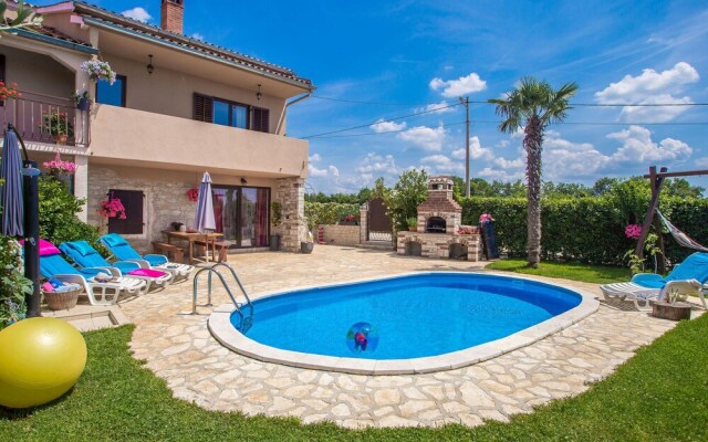 Nicely decorated semi-detached house with pool and  fenced yard