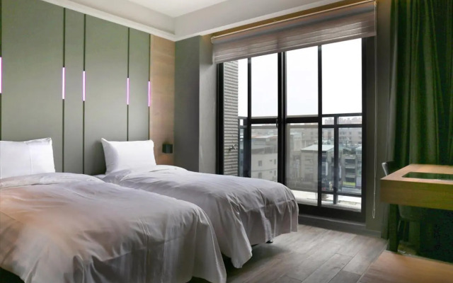 Kiwi Share Hotel - Zhongli Station Branch - Hostel