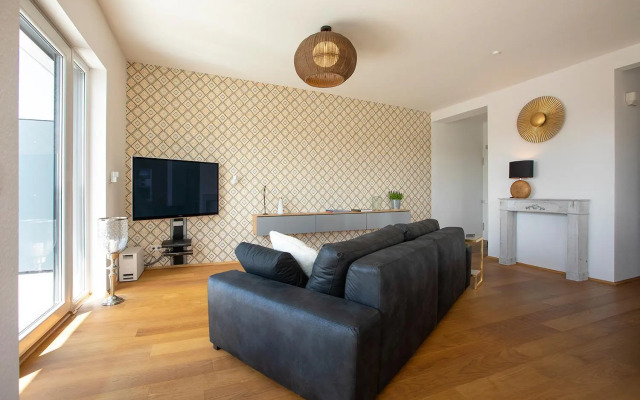 AT THE TOP - Penthouse über den Dächern der Stadt