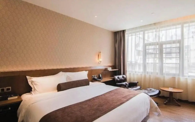 Xingyi Chain Hotel Jiangxia Metro Station