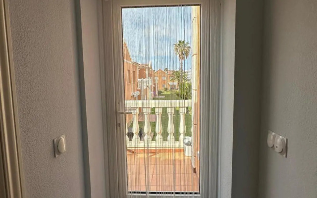 Oliva Nova flat in front of MET