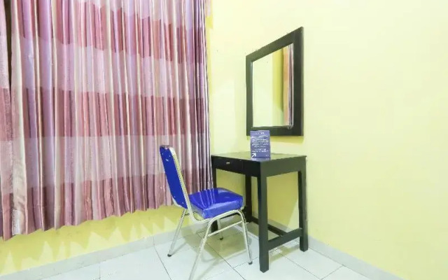 SPOT ON 2440 Wallet Family Residence