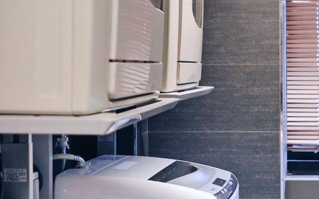 Kiwi Share Hotel - Zhongli Station Branch - Hostel