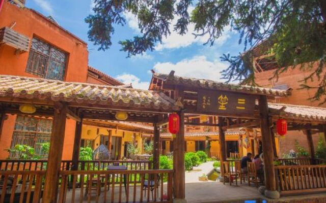 Sansheng Garden Inn (Puzhehei Xianrendong Shop)