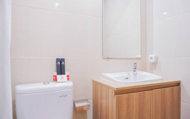 Clean and Elegant 1BR at The Oasis Apartment