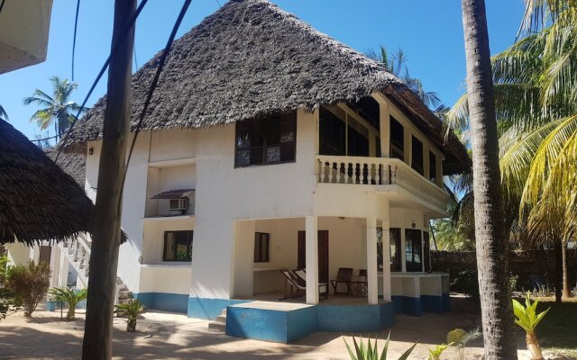 "room in Guest Room - Romantic Room With Access to Beach Ideal for 2 Guests, in Kigomani, Zanzibar"