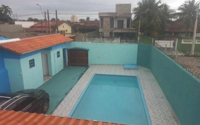 CASA DE PRAIA CARAGUA COM Piscina