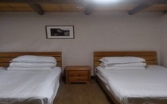 Nanjing Tulou Qingdelou Inn