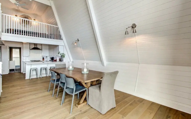 Roomy Chalet-Style Beachfront Condo with Private Beach Access by RedAwning