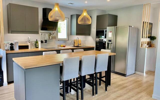 T4 climatisé, avec jardin et parking - au calme