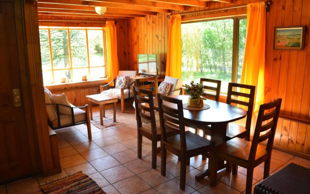 Hostal y Cabañas "El Coigüe"