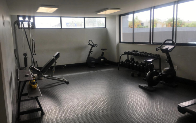 Highrise Windhoek apartment with skyline view, pool and gym