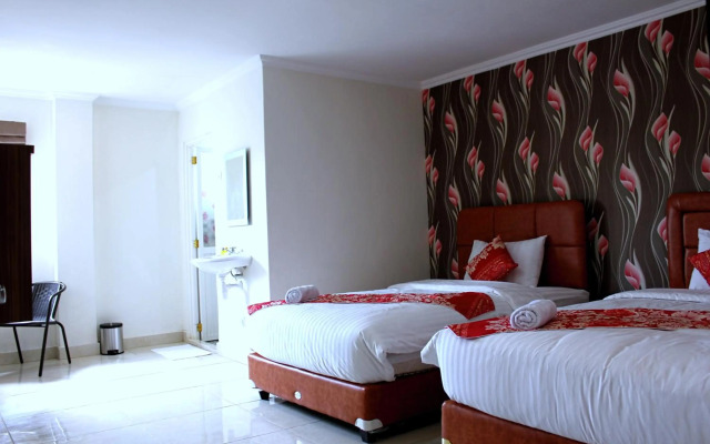 Airy Mapanget AA Maramis Manado