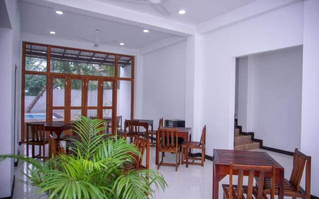 Sea Cloud Dalawella by OYO Rooms