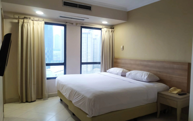 Grand Tropic Suites Hotel