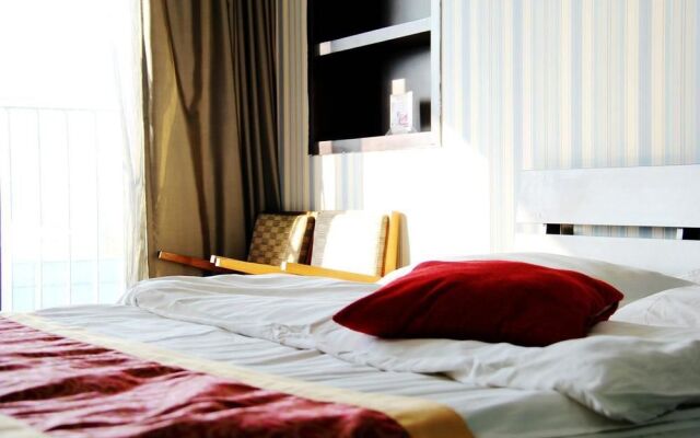 Enji Apartment Hotel Bainianhui - Dalian