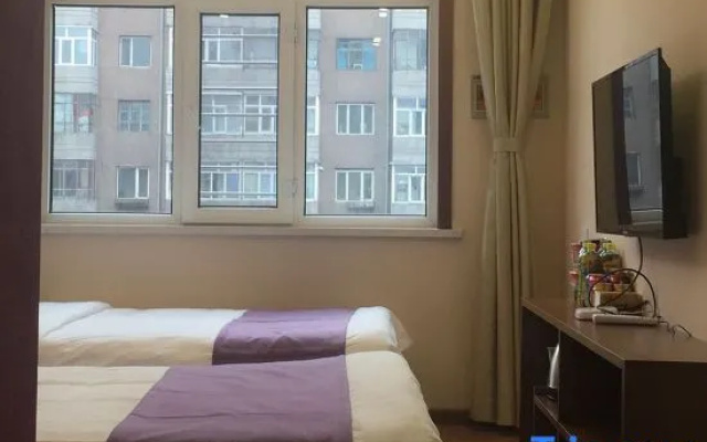 Xinyue Hotel (Mudanjianghuochebeizhanxinhualudian)