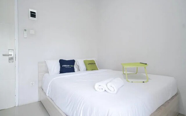 Urbanview Hotel Bari Syariah Palembang By RedDoorz