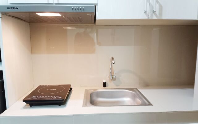 Homey And Tidy Studio Apartment At Vida View Makassar