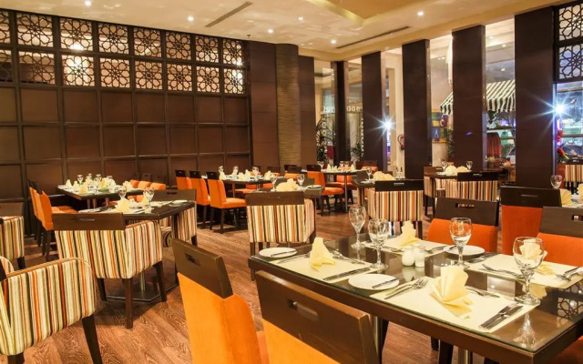 Golden Tulip Suites Breida Al Q