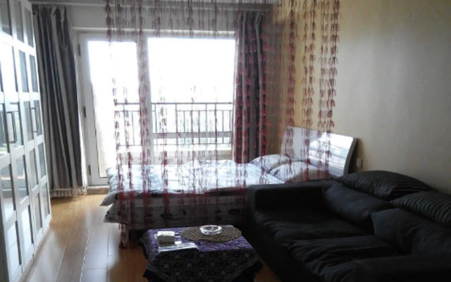 Dalian Hehe Apartment Hotel