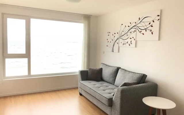 De la Costa Apartamento
