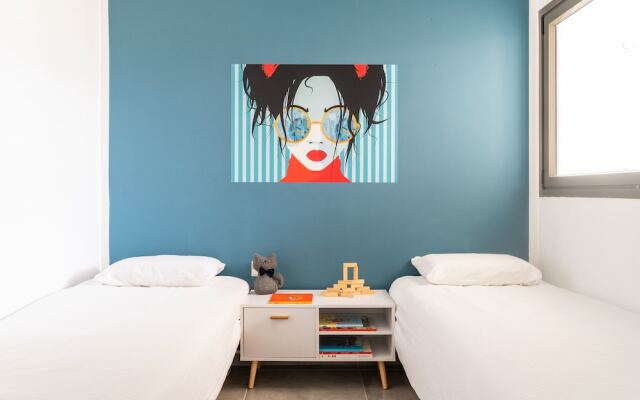 Vibrant Seaside Stay with Balcony by Sea N' Rent