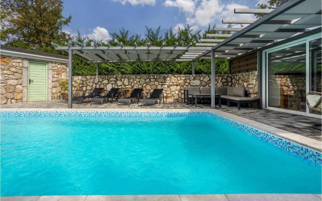 Two-Bedroom Holiday Home in Smrika