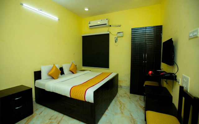 The ECR Grand Residency by OYO Rooms