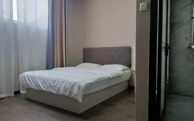 Dexin Express Hotel (Zhangqiu Harmony Plaza)
