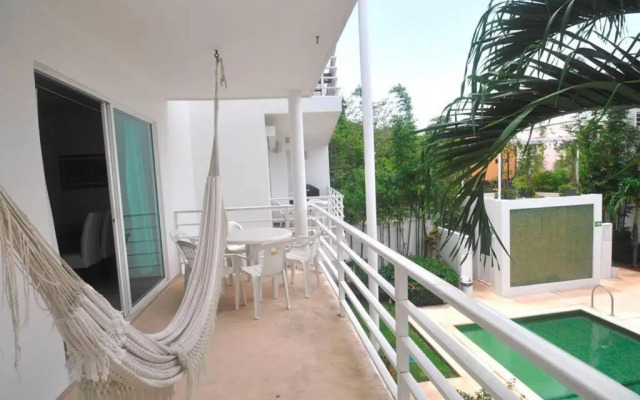 Poolside tranquil apartment in Playa del Carmen