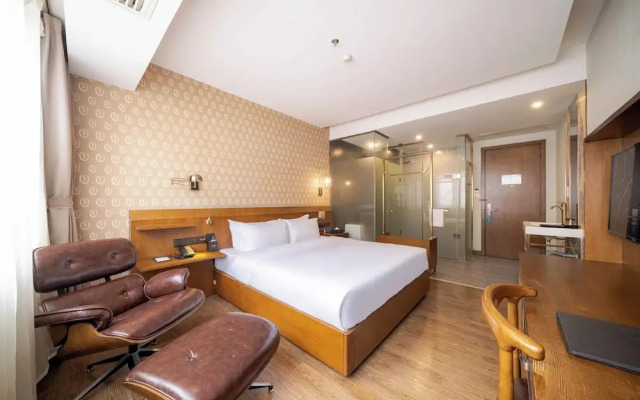 Xingyi Chain Hotel Jiangxia Metro Station