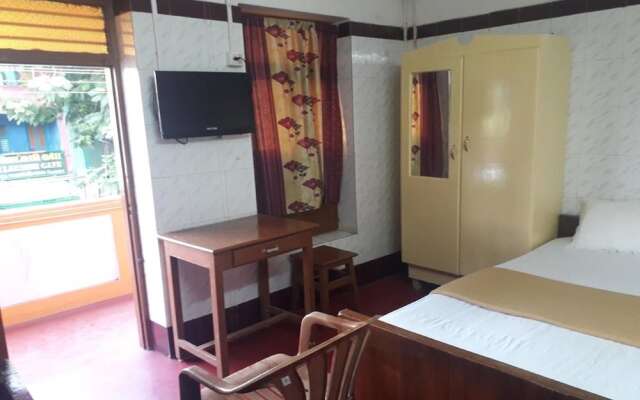 Parisha Residency - Temple Side Hotel