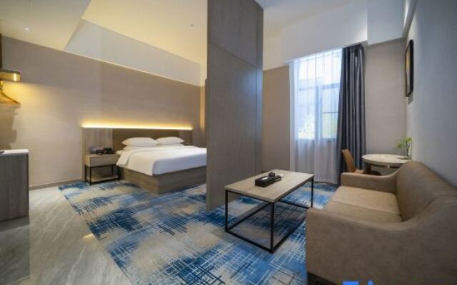 Zhangzhou Happiness Hotel (Gucheng Niuzhuang Branch)