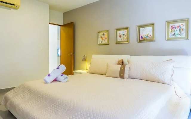 Lunada 314 Modern Playa del Carmen Condo with Tropical Garden View by RedAwning
