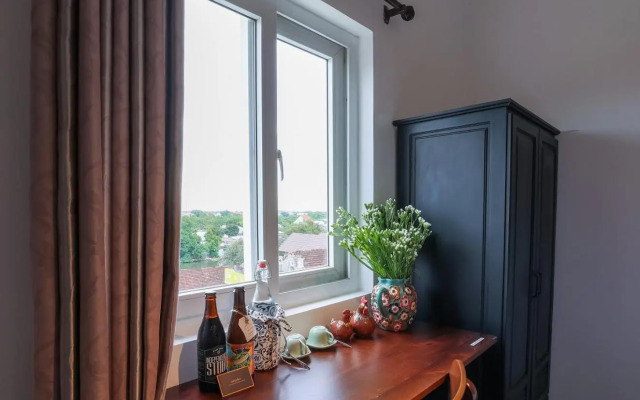 Purple Hue Charming Riverside Hotel