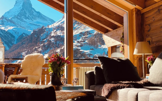 Mountain Exposure Luxury Chalets & Penthouses & Apartments
