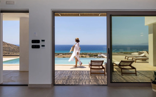 Monogram Travel Tinos