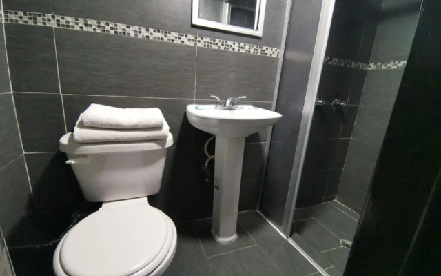 Capital O Baja Place Inn