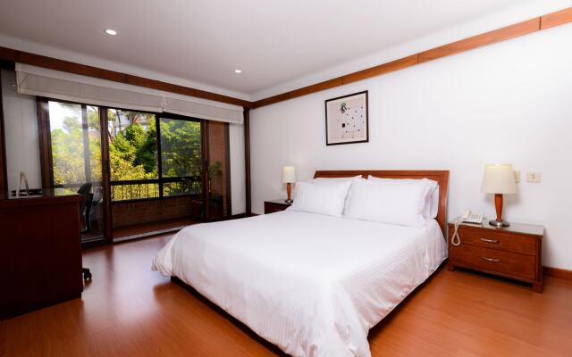 Travelers Suites Condominio Plenitud