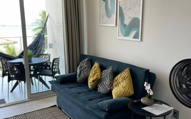 Pé na areia do Caribessa - Branco Haus