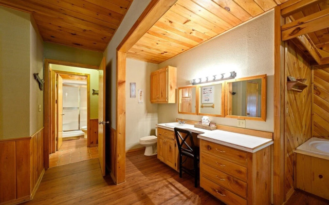 Cast Away Family Cabin with Hot Tub, Fireplace, and Kids Area by RedAwning