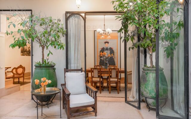 Riad Le J