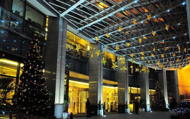 Huaqiao New Century Grand Hotel