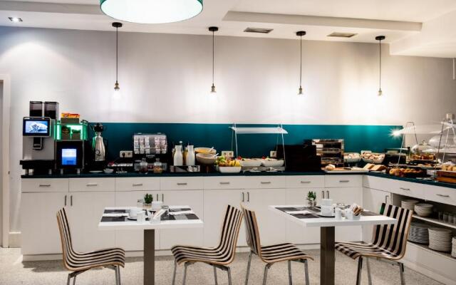 Ikonik Plaza Mercado