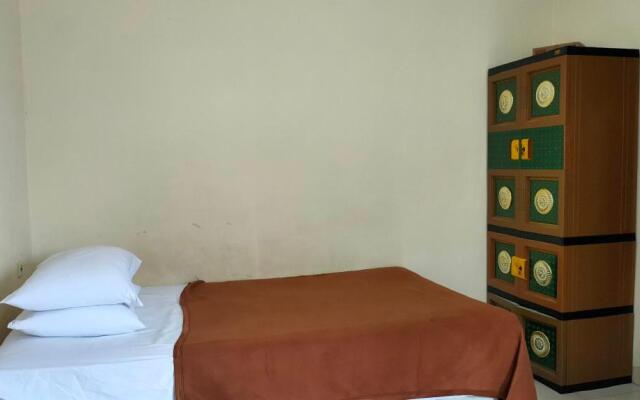 OYO 90090 Adhyaksa Syariah Guest House