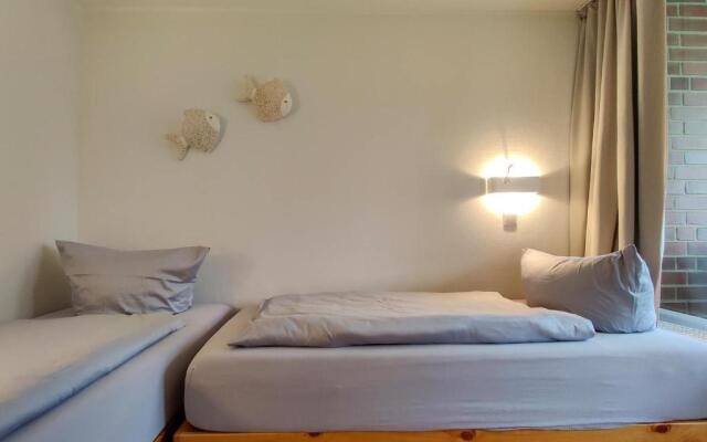 Ferienwohnung-11-mit-Terrasse-und-Strandkorb-am-Strand-Haus-Hohe-Worth-Duhnen