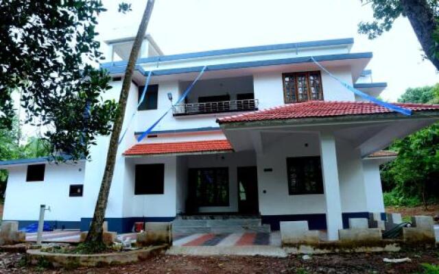 TravelKannur Style Home