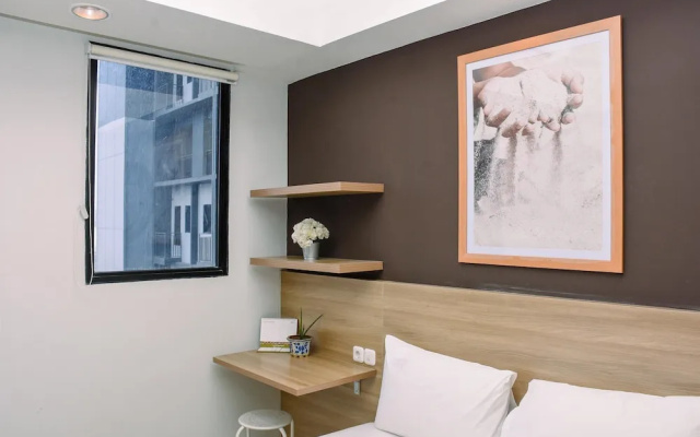 Comfy Studio Room at Evenciio Margonda Apartment